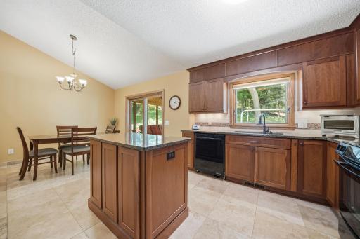 The center island adds even more workspace and storage, making meal prep, entertaining, or everyday life a little easier.