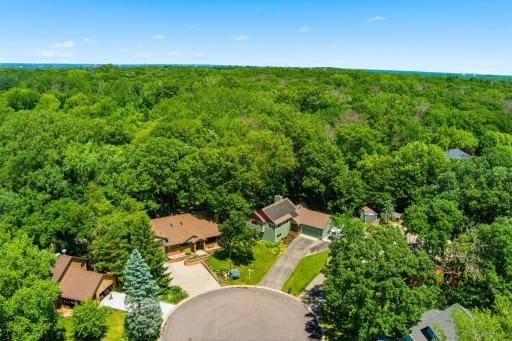Adventure starts at home. Welcome to 12568, where a private gate connects you directly to the trails and natural beauty of Lebanon Hills Regional Park.