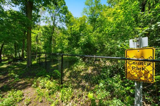 Adventure starts at home. Welcome to 12568, where a private gate connects you directly to the trails and natural beauty of Lebanon Hills Regional Park.