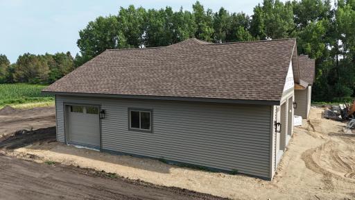 Convenient side overhead door for lawn mower or toys