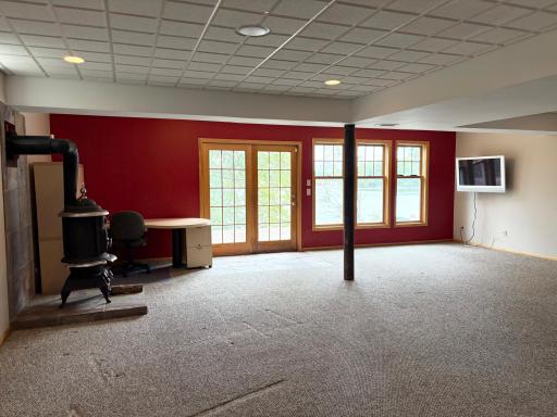 Rec room in lower walk out level main house complete with potbelly stove