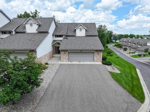 Exceptional Baywood townhome end unit on the Chain of Lakes.