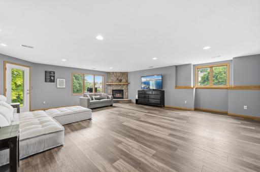 Downstairs, the finished lower level features a family room, 2 more bedrooms, and an additional bathroom.