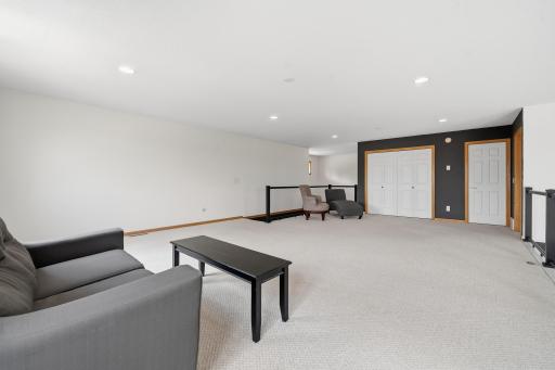Whether used as a media room, home office, playroom, or reading retreat, this generous loft adapts to your lifestyle.