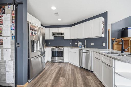 Stainless steel appliances create a clean, cohesive look that is easy to maintain.