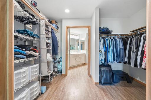 The primary bedroom also offers a private ensuite and tons of closet space ideal for storing and organizing all your personal belongings.