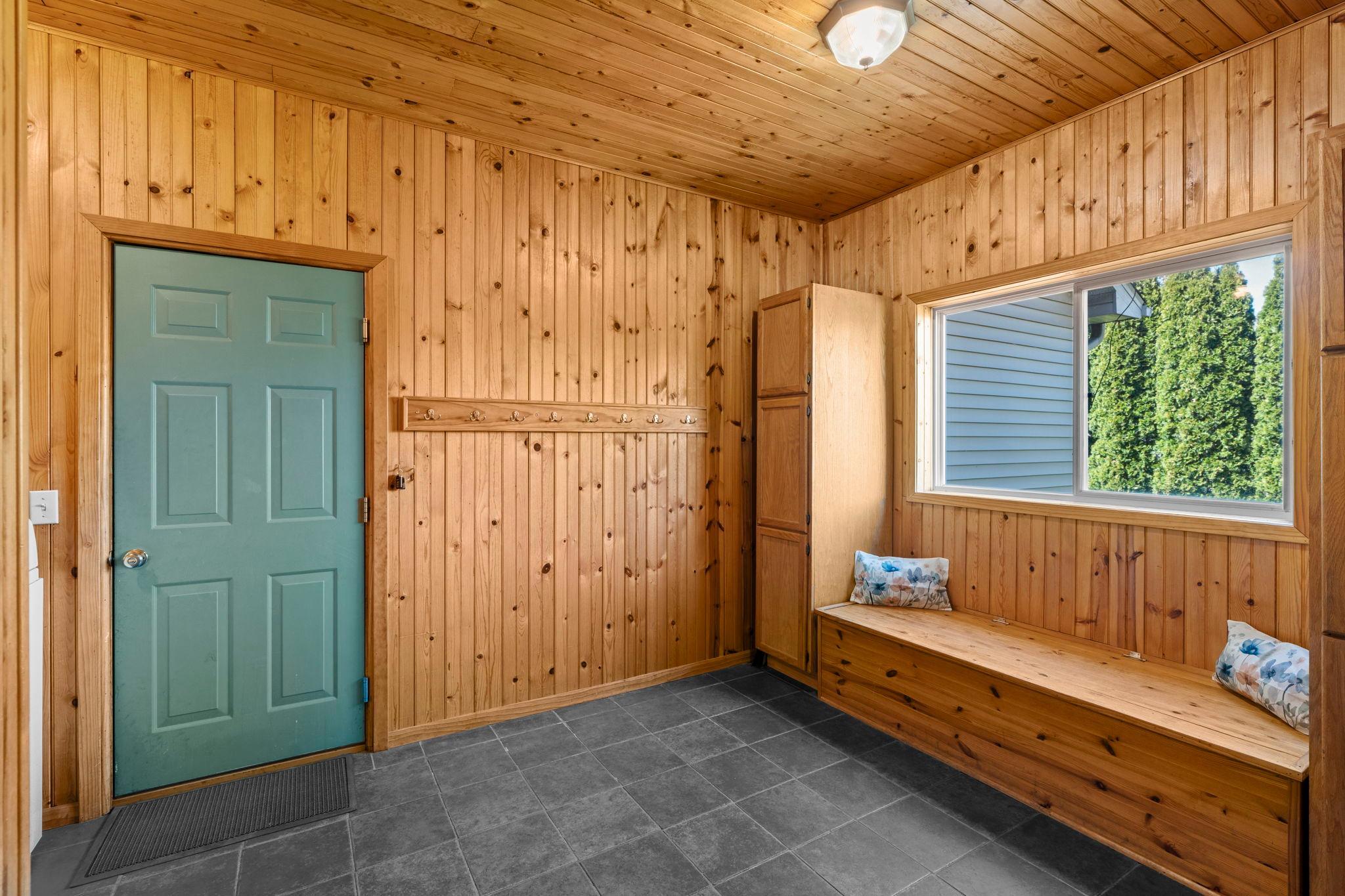 Large laundry, storage and garage entry door space