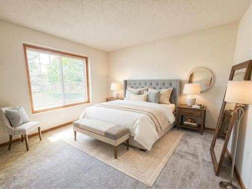 Large secondary bedroom offering flexibility for furnishings and personal style.