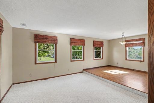 Dining Room has wood floors and a Family Room next to it.
