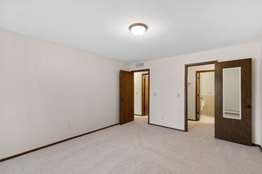 Primary Bedroom features and walk through closet & Private 3/4 bath
