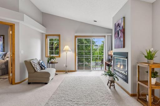 Vaulted ceilings highlight the architectural detailing, enhancing the home’s unique character and creating a captivating sense of architectural interest.