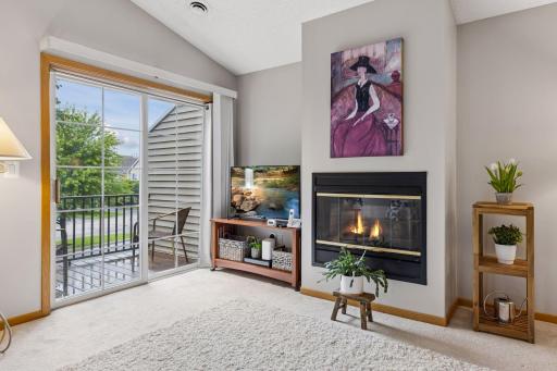 A gas fireplace adds warmth to the living area while enhancing the overall ambiance, creating a cozy and inviting focal point.