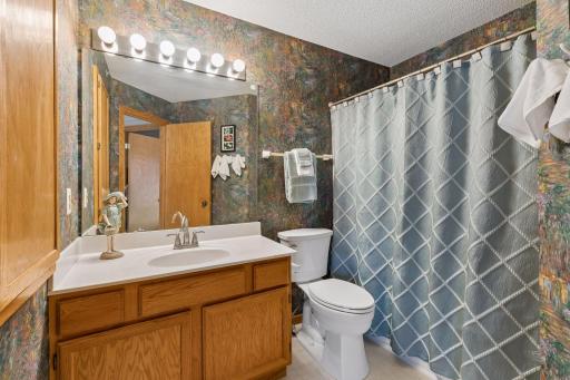 The full bath is generously sized, providing exceptional space compared to most homes in this price range.