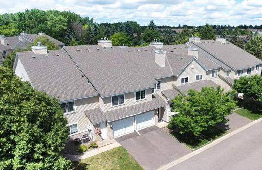 What a fantastic setting! Unit 80 is a spacious, sun-filled southwest-facing upper-level corner unit featuring oversized windows and a private deck overlooking the treetops.