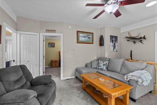 The high ceiling and steaming sunlight make this living room sparkle.