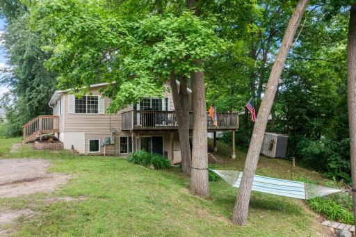 Relax in the hammock under the tree tops before heading to your deeded lake access for a swim..jpg