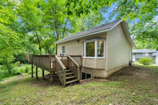 Just a few steps down from the deck is easy access to your new backyard..jpg