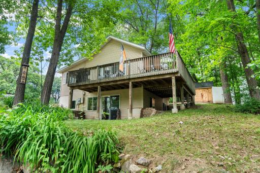 This beautiful photo showcases the large deck and lower patio--perfect for outdoor living..jpg