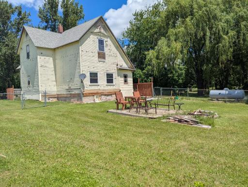 This huge fenced in yard means you can get more dogs!
