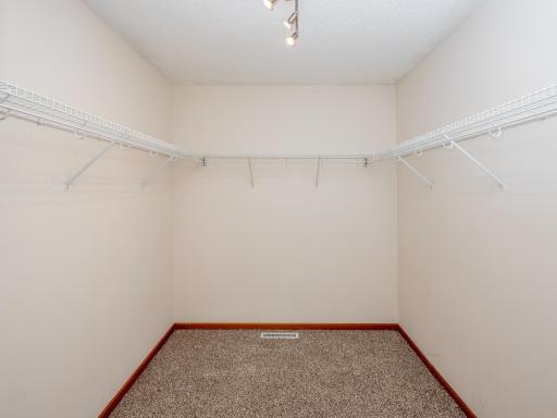 Walk-in Primary Closet with Loads of Opportunity to Customize