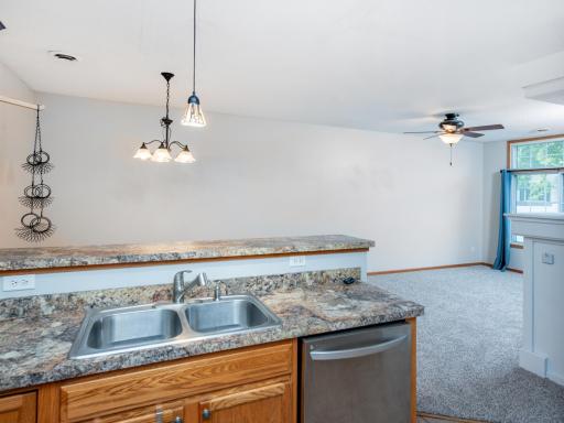 Convenient Double Sink and Raised Bar Top