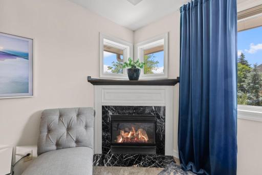 Primary bedroom gas fireplace