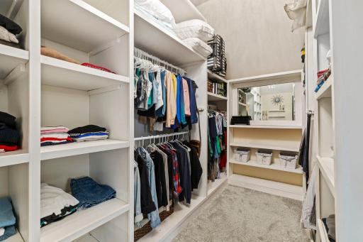 Primary bedroom walk-in closet