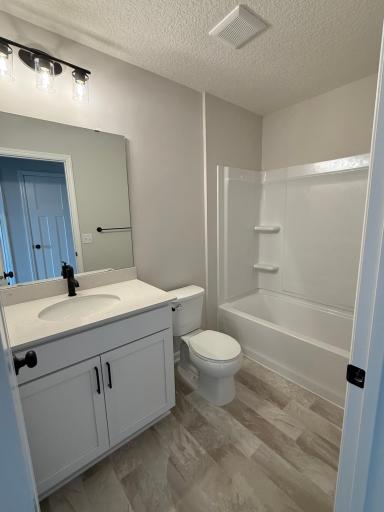 Also, on the top floor we have a shower/tub combo which is set up great for secondary use and for when the fur babies need a bath!