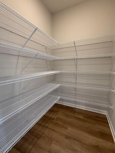 A massive pantry featuring 5 racks allows for maximum storage.