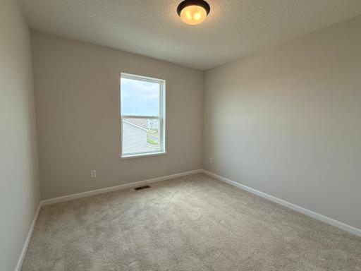 The secondary bedrooms are perfectly sized for everyone.