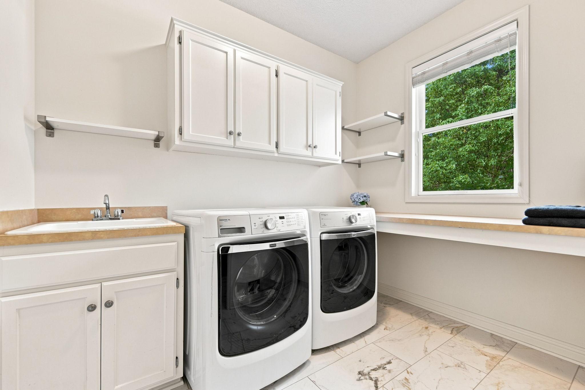 Spacious Landry room with everything you need