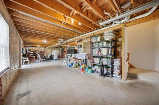 The lower level is unfinished and begging for you to finish it