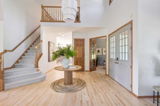 Front foyer, refinished hardwood maple floors and new lighting.