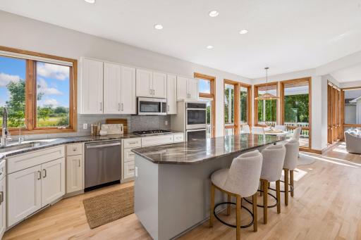 Full kitchen remodel. Quartzite counter tops and center island. Cooktop, double ovens.