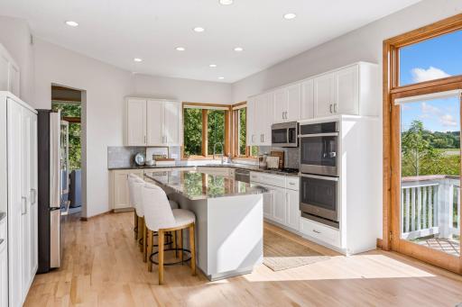 Full kitchen remodel. Maple hardwood floors. Quartzite island, double ovens, separate cooktop, French door refrigerator. So much storage.