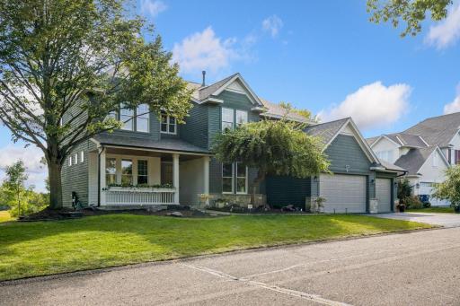27125 Marsh Pointe Ct has been lovingly reimagined. Here with new exterior paint. Newer roof, new lighting. Welcoming front porch with charming bead board ceiling.