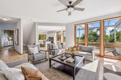 Gathering room open to dining area and kitchen, yet spaces are defined and comfortable.