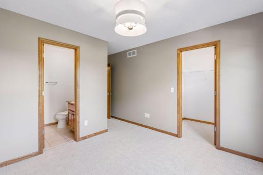 Private bath and walk-in closet for bedroom #4.