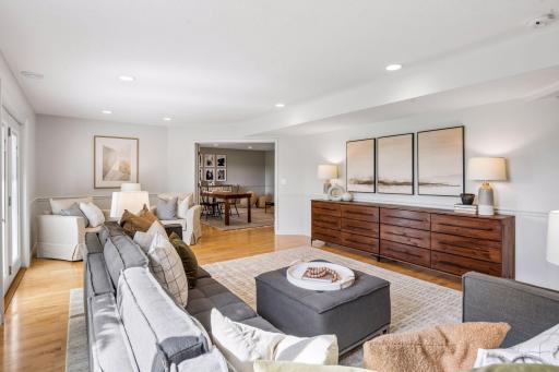 Walk-out lower level with handsome maple plank flooring.