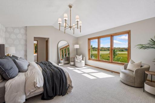 Primary suite - step inside and feel the calm. New lighting, new carpet. Views of the marsh.