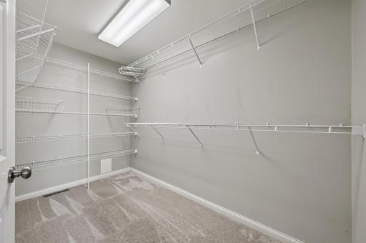 Primary bedroom spacious walk-in closet
