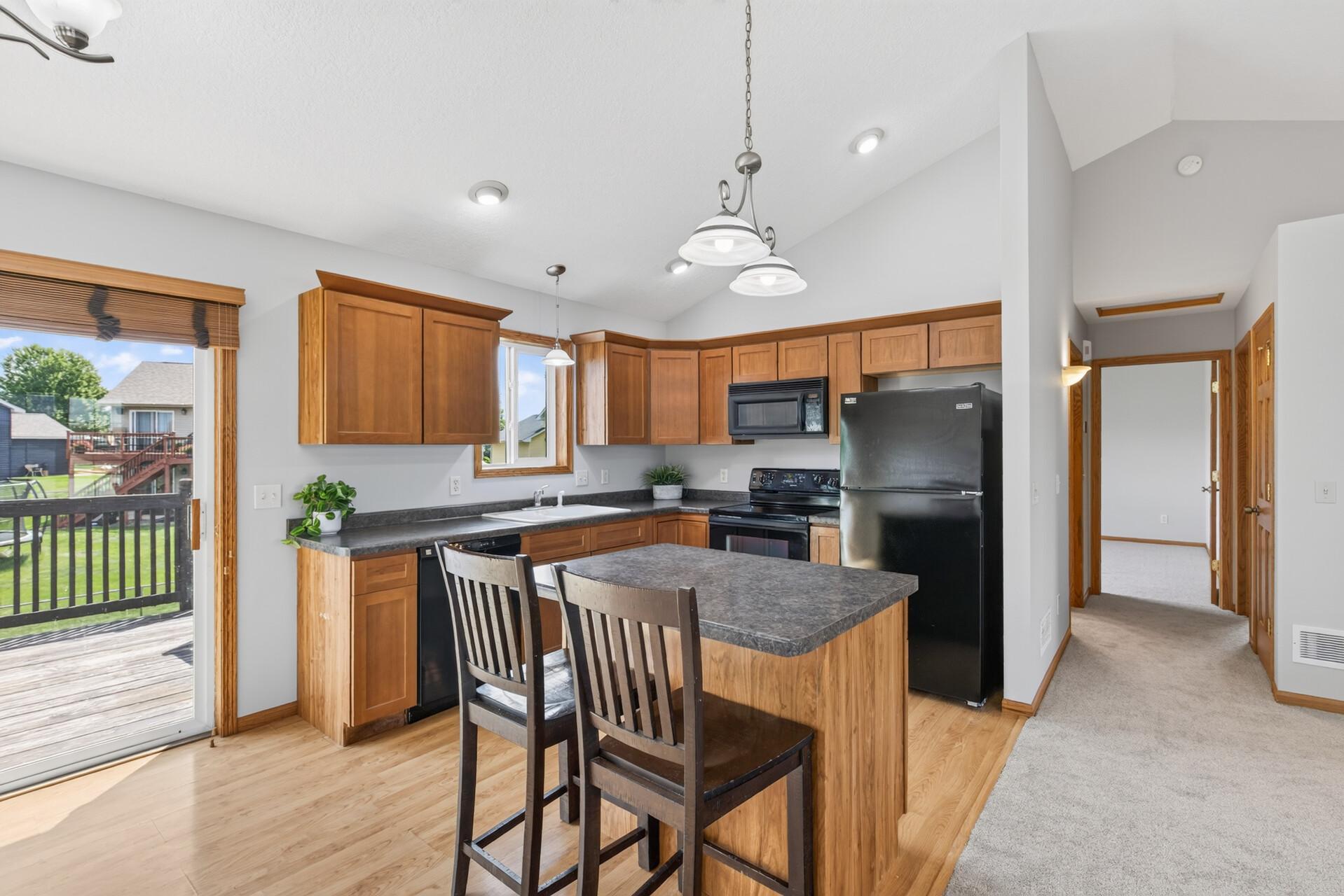 This cheerful, light-filled kitchen checks every box; open concept, breakfast bar, island storage, and a layout that keeps everyone connected whether you're cooking or catching up.