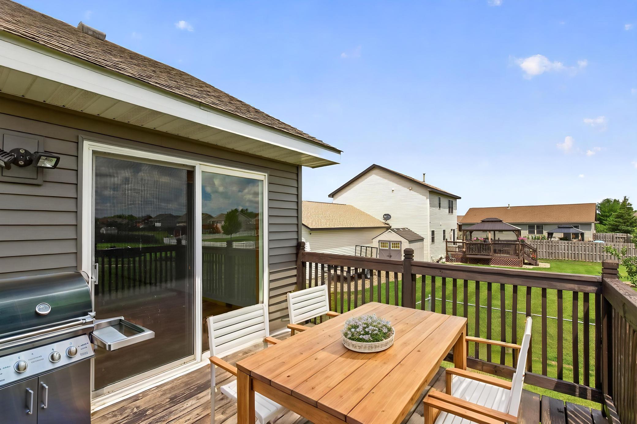 Deck overlooks the entire large fenced yard! Great for grilling and entertaining! Better than a new build!