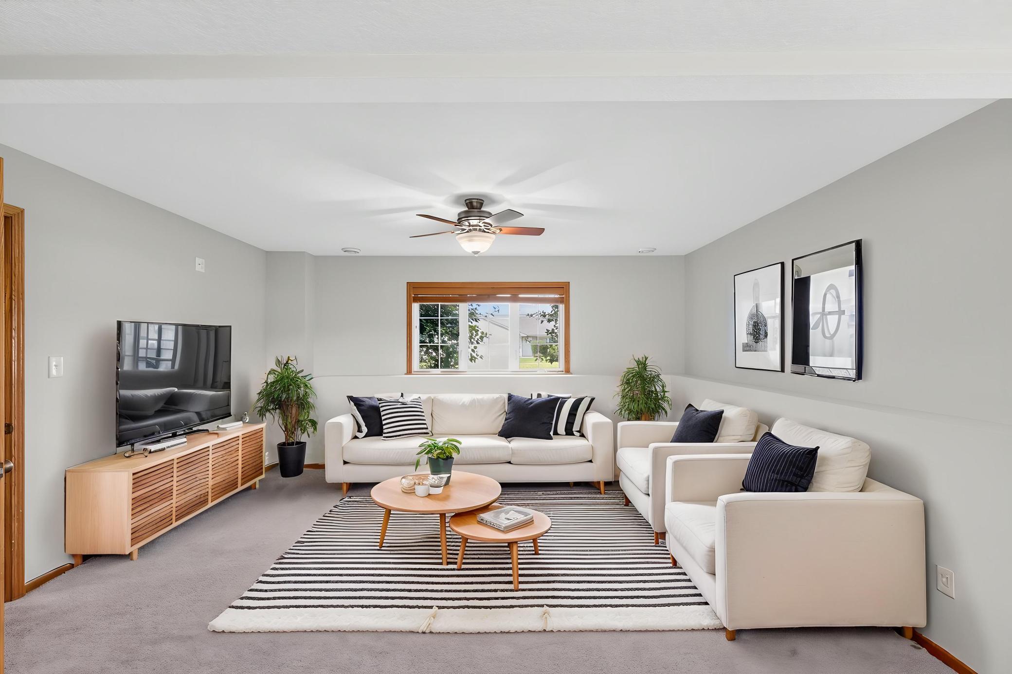 Large lower level family room! Remember all window treatments are included with the home!!