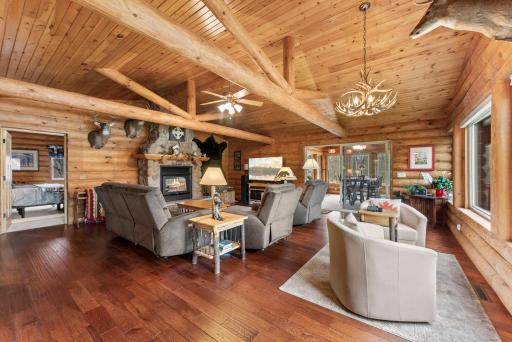 Great room with woodburning stone fireplace