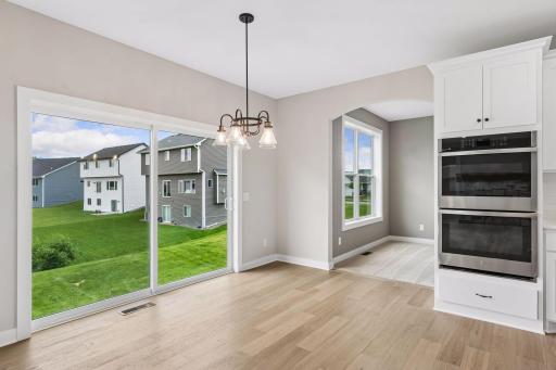 The informal dining room is just steps away from the kitchen.