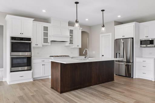All our features are standard including the granite countertops, tile backsplash and under mount kitchen sinks.