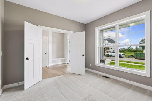 Just off the entry is a beautiful study, with views out the front of the home.