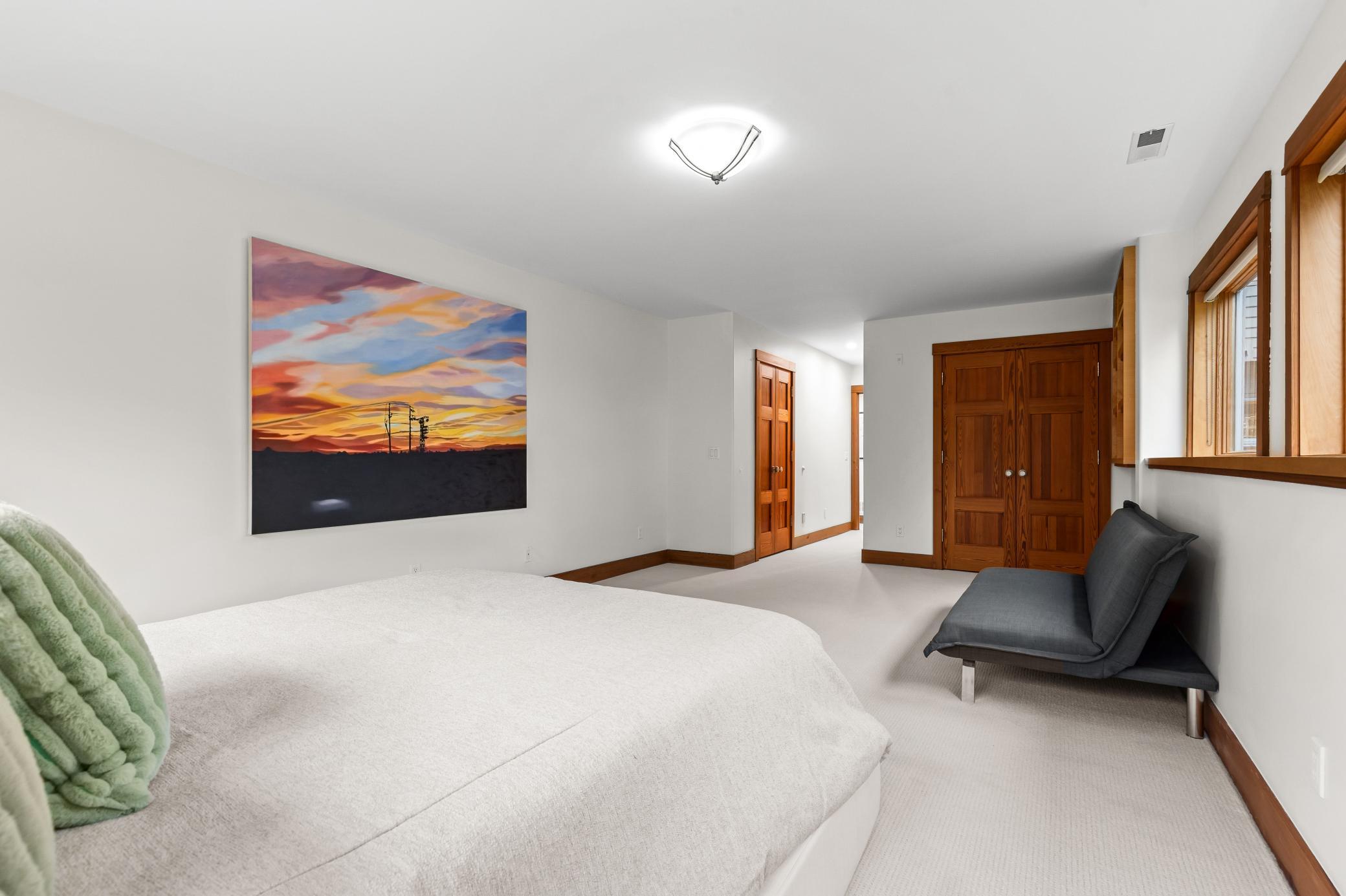 Lower level bedroom with generous walk in closet