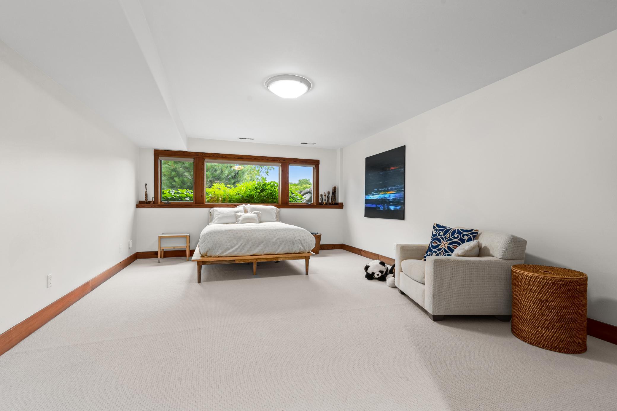 Lower level third bedroom with natural light